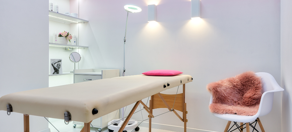 Elegant beauty salon interior after renovation by Deco Wood, featuring custom stations, ambient lighting, and premium finishes