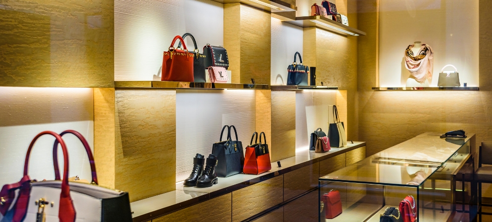 Stylish retail shop interior after a professional shop fit out by Deco Wood, featuring custom shelving and elegant lighting.